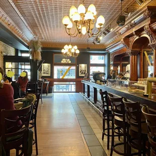 a woman sitting at the bar