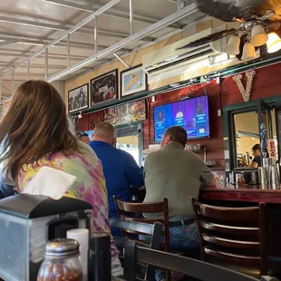 people sitting at the bar