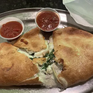 Calzone with Italian sausage and spinach