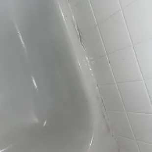 Poorly refinished bathtub