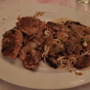Marsala mushroom and onion in a marsala wine sauce served over pasta