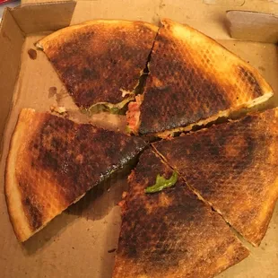 Burnt. There's a slice missing. Dog loved it.
