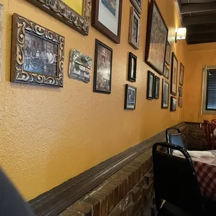 Quaint, with pictures on the wall.