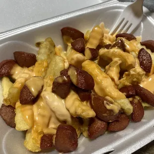 a fork in a styrofoam container