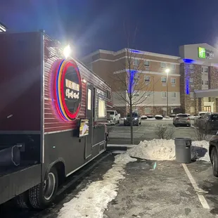 a food truck parked in a parking lot
