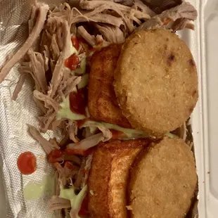 Venezuelan Arepas (pulled pork-fried cheese-corn buns-avocado crema)