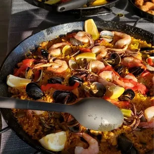 Traditional paella (near) and vegan paella (far)