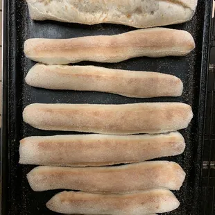 breadsticks on a baking sheet