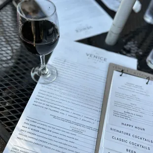 Happy hour menu and Malbec wine