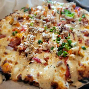 a close up of a pizza