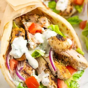 a pita filled with chicken and vegetables