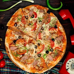 a whole pizza with several toppings