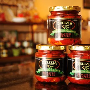 three jars on a countertop
