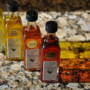 a variety of bottles of olive oil