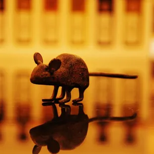 a mouse figurine on a table