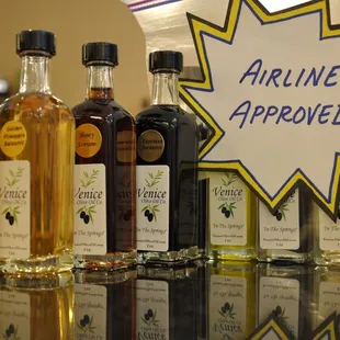 a variety of bottles of olive oil