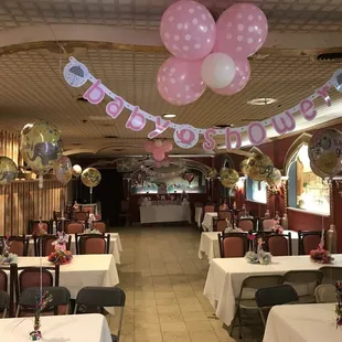 a restaurant decorated for a baby shower