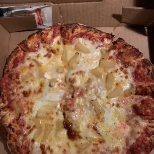 Three cheese pizza with pineapples