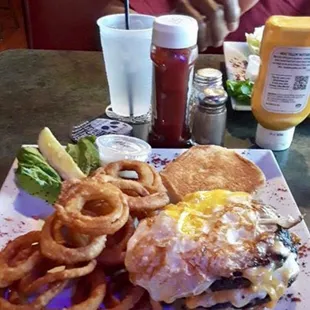 a burger and onion rings