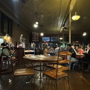 a group of people sitting at tables