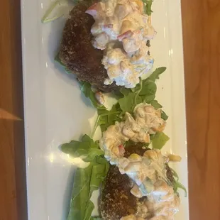 two meat patties on a plate