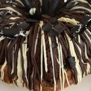 Gluten-free, dairy/ free Mable Bundt cake with a dairy free Belgian chocolate drip.  Available in regular flour  too.