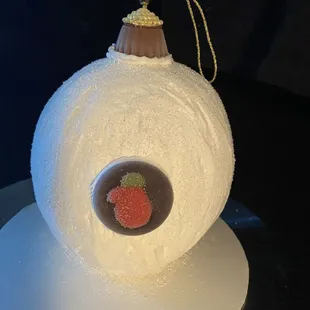 a cake with a strawberry on top