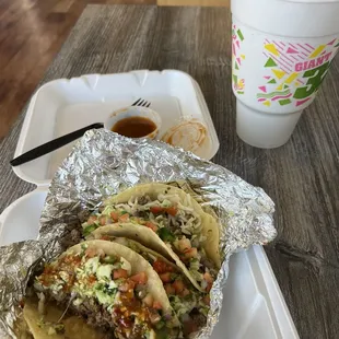 Carne asada tacos with spicy salsa.