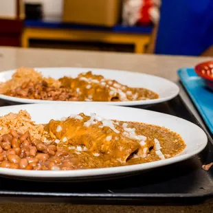 Beef enchilada with rice and beans