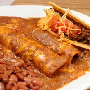 enchiladas with a beef taco and beans