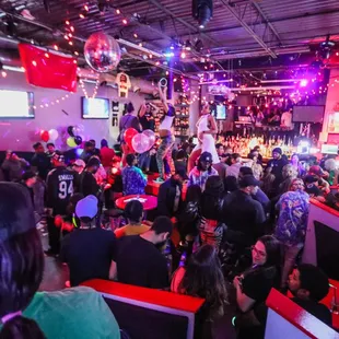 a large group of people at a party