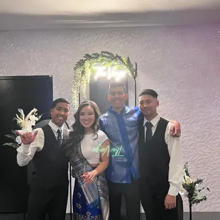 Pictures at our backdrop with some of the groomsmen in our traditional Lao and Cambodian attire.