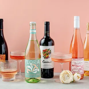 a variety of wine bottles and glasses