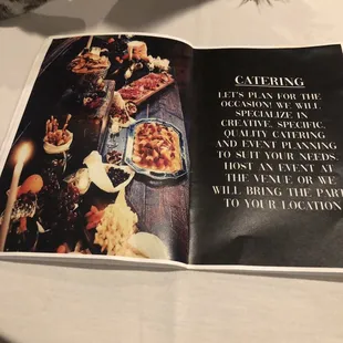 a spread of a magazine with a picture of a table full of food