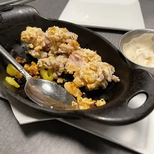 Very poorly prepared fried calamari. Cold inside, not very crispy exterior.