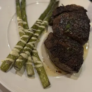 Filet mignon served with asparagus. Cooked perfectly to the temp requested. The buttering on the asparagus is the perfect touch.