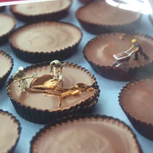 Close-up of Big Appetites card I got for my brother, with tiny construction workers repairing a peanut butter cup!