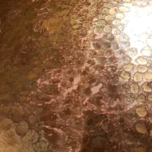 They have hammered copper tables! Very cool!