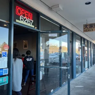 customers entering the restaurant