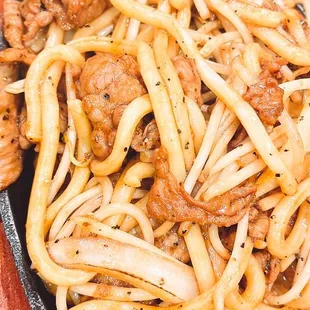 Sautéed beef over sizzling pan