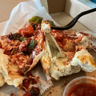 This is the not cooked dough in my calzone of which I asked for no green o ions. Thought it was cheese. It's just raw dough.