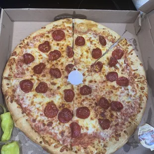 Pepperoni pizza with regular cheese (not double cheese)