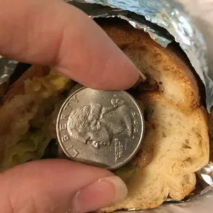 12” Cheesesteak sub, mostly bread, fillings amounting to a quarter sized amount —meat and all other ingredients. This is a bread sandwich.