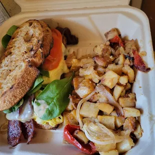 Barrio breakfast sandwich with potatoes.