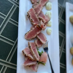 a plate of seared tuna