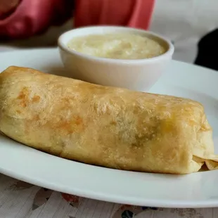 Spanish breakfast burrito with grits, $8.95