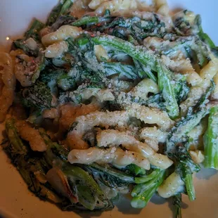 a plate of pasta and asparagus