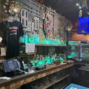 a bar with a variety of liquors