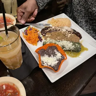 Trio of Enchiladas with a Top shelf Margarita.