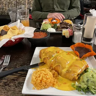 a plate of mexican food on a table